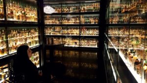 Emma inside The Diageo Claive Vidiz Scotch whisky collection at The Scotch Whisky Experience Edinburgh