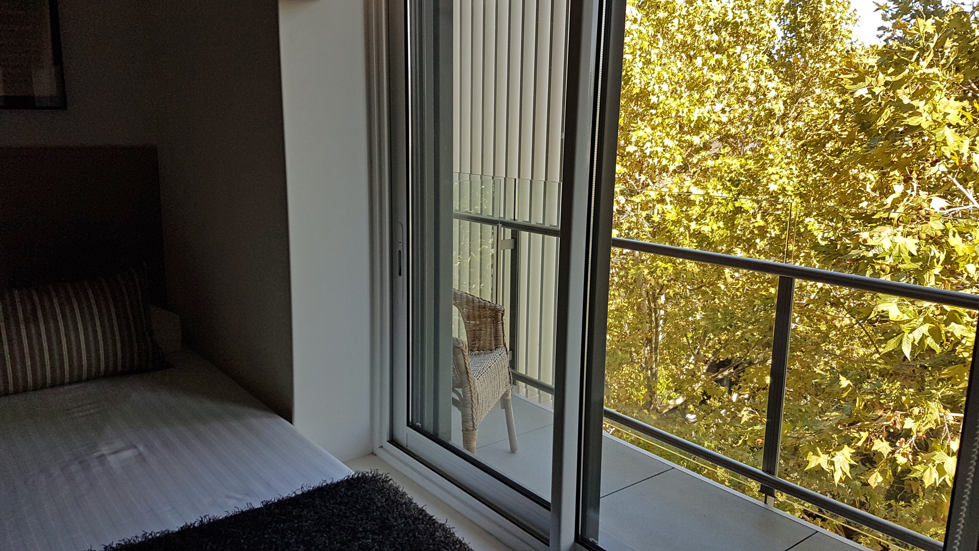 mics-sant-jordi-apartment-bedroom-balcony-view