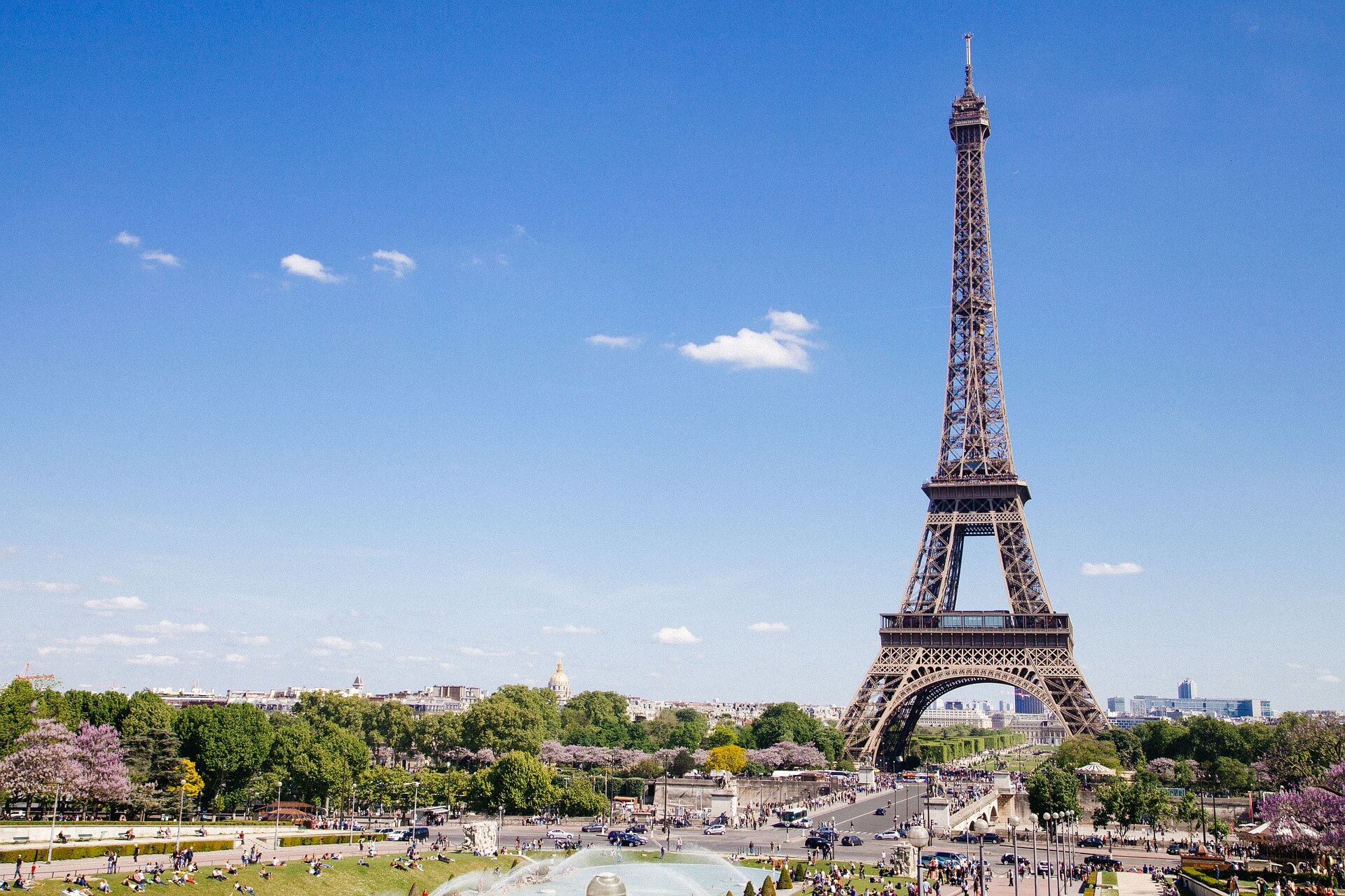 5 of the Safest Cities to Navigate With a Disability: Eiffel Tower in Paris on a sunny day with clear blue skies.