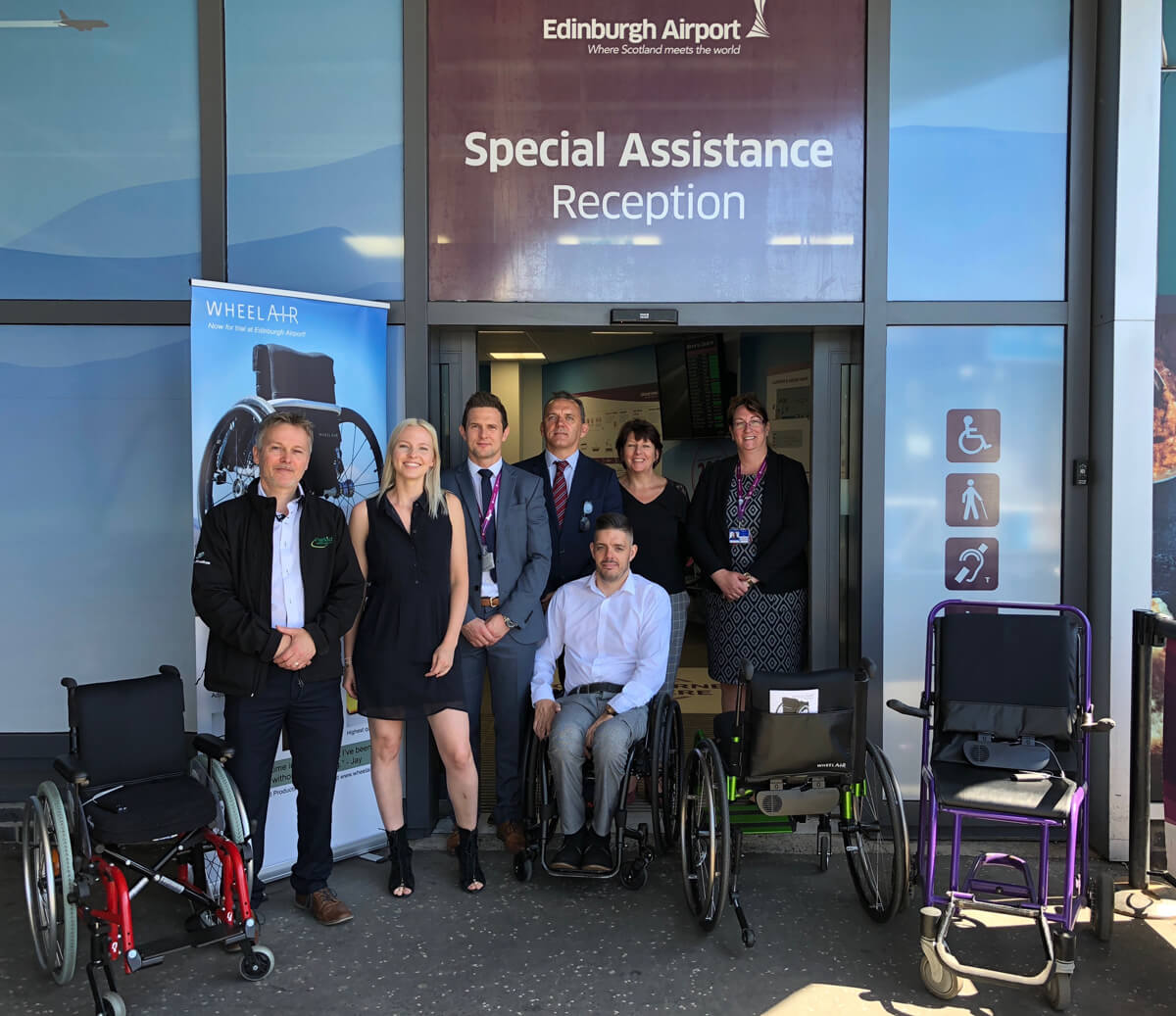 Representatives from Edinburgh Airport, Omniserv and wheelAIR at launch