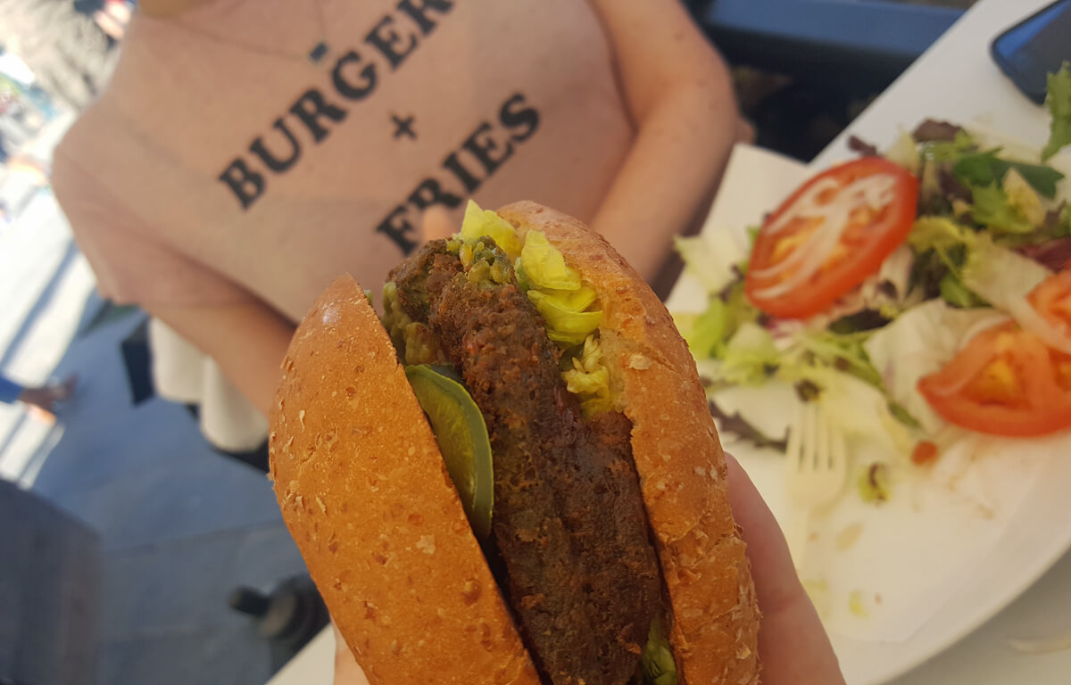 A close up shot of the Gran Vegano Bacoa burger.