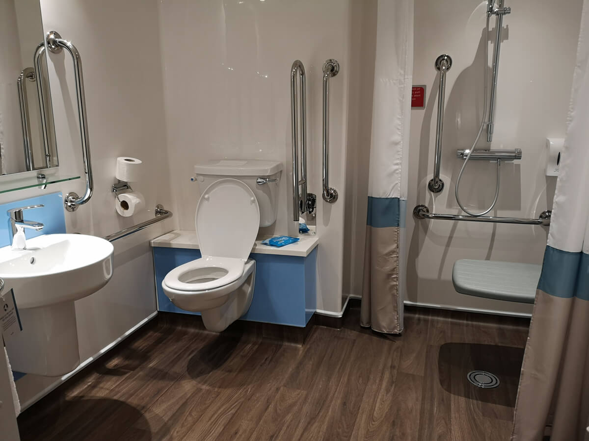 Travelodge Solihull wheelchair accessible SuperRoom bathroom.