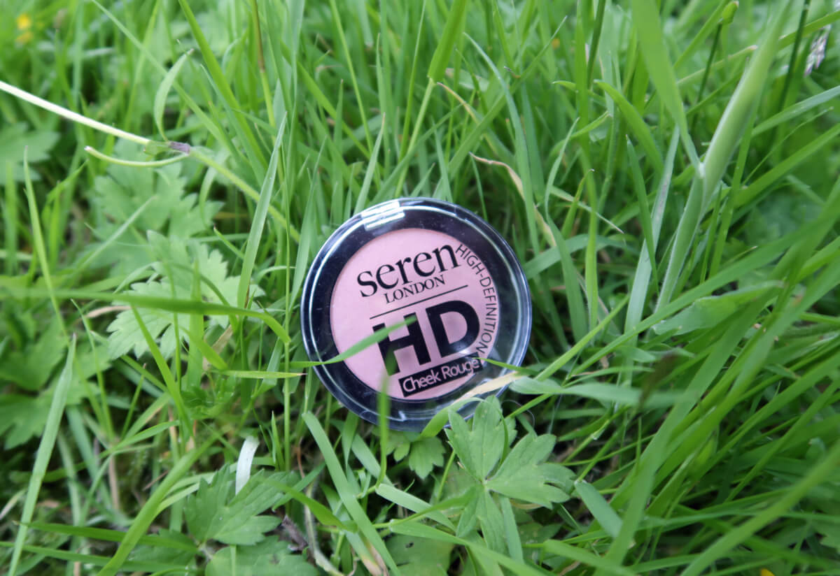 Seren London HD Cheek Rouge placed on the grass.