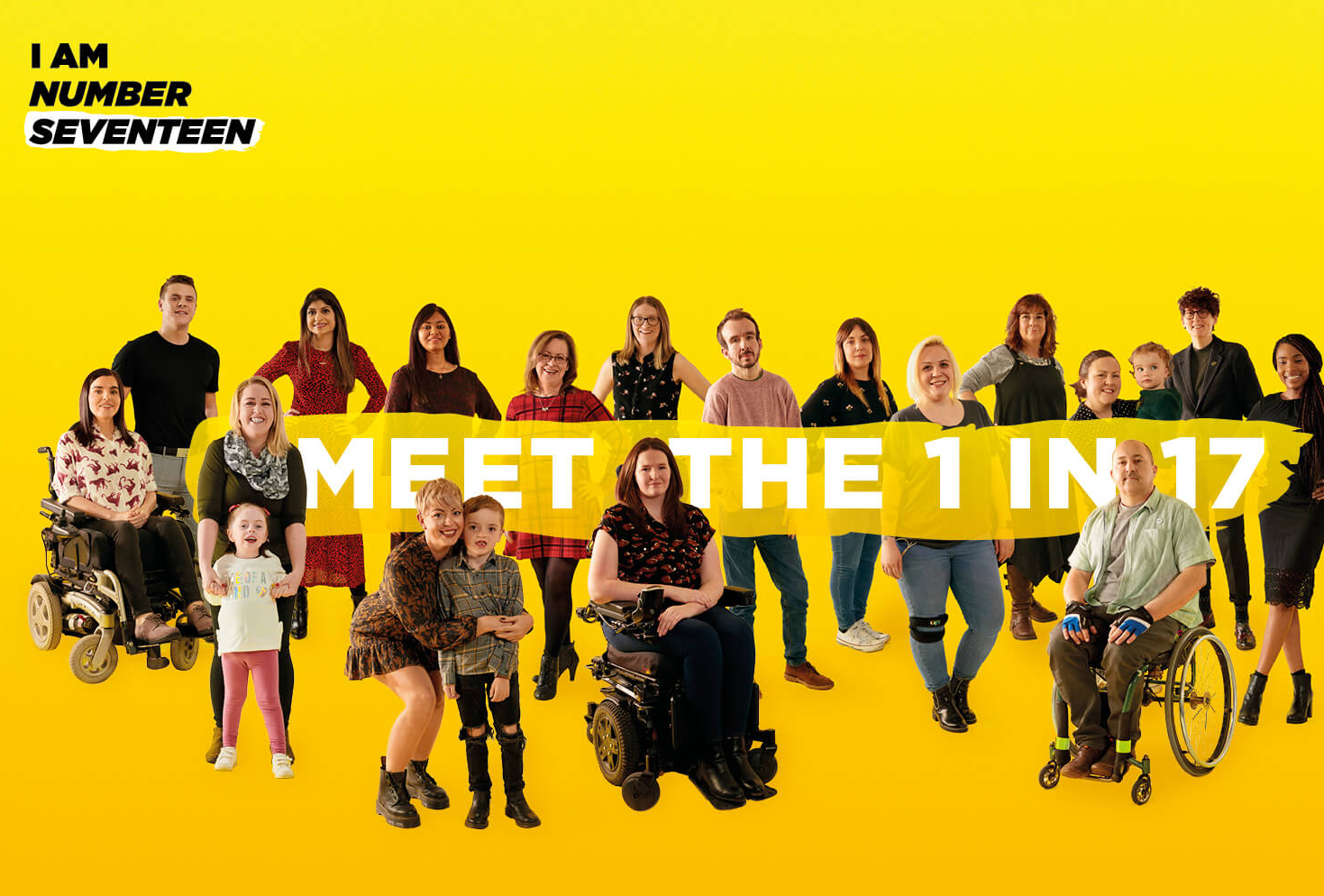 A yellow background with seventeen people with a range of rare conditions posing. A banner is floating across the photo with the words "Meet the 1 in 17".I Am Number 17