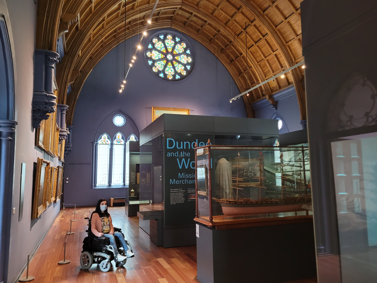 Emma sat in the The Dundee and the World gallery is set in the stunning Albert Hall