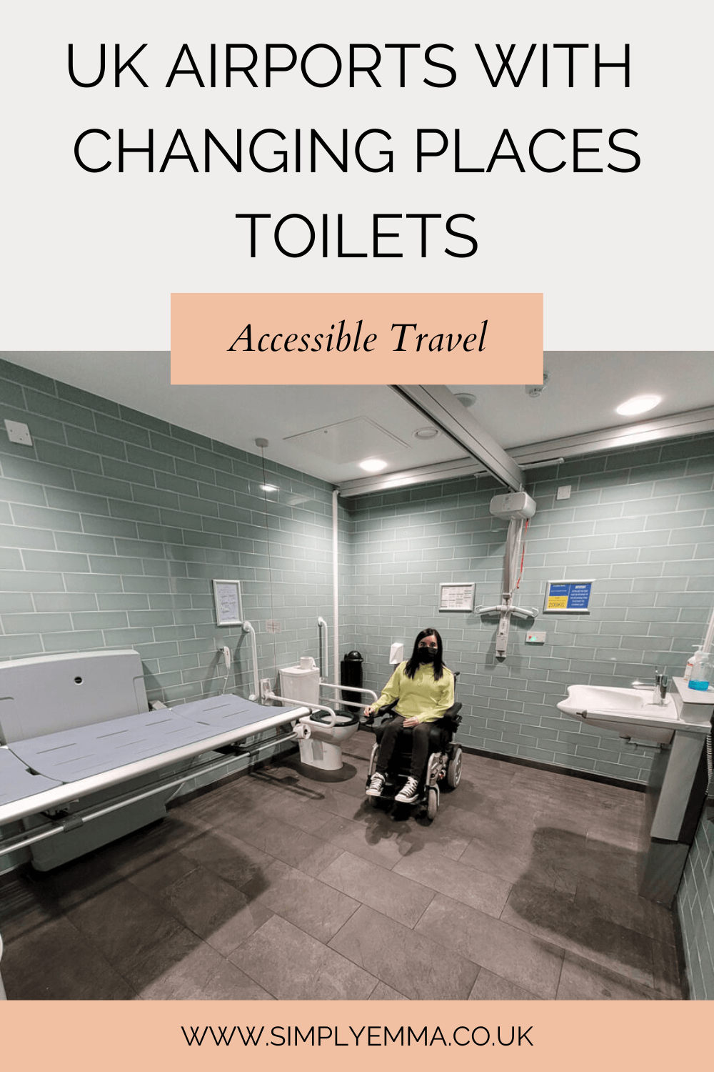 Emma, a white female powerchair user with dark shoulder length hair is is a Changing Places toilet. The walls are mint green brick tiles and the floor is grey slate tiles. There is adult-sized changing bed, peninsular toilet and sink, ceiling-track hoist, grab rails and a shower. Text reads "20 UK airports that have Changing Places"