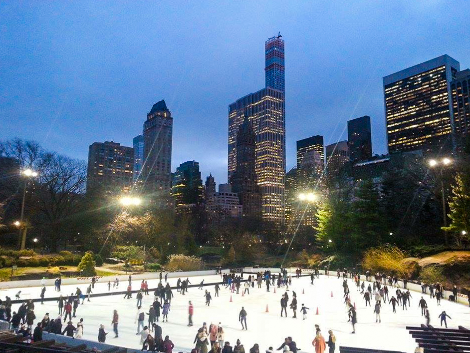 tourists and skaters in the famous Wollman Rink in Central Park