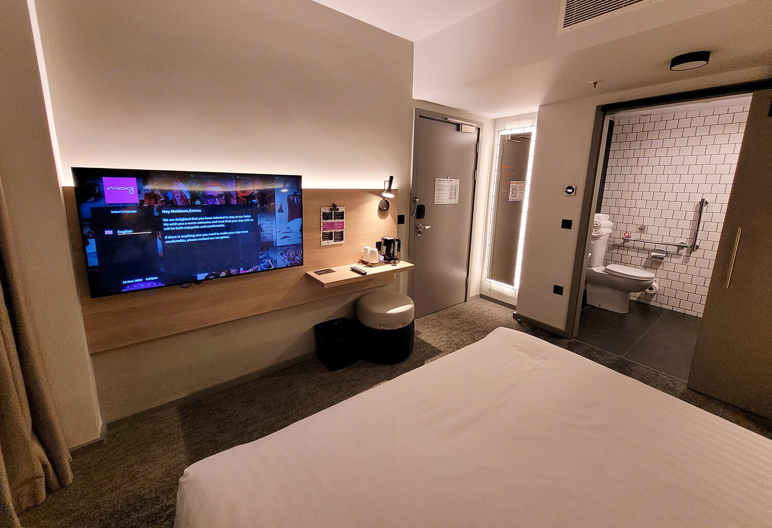 A view looking across the accessible room at the Moxy Manchester City hotel.