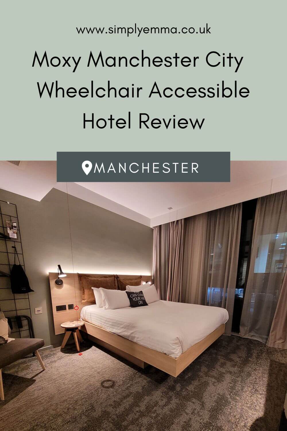 Pinterest image showing Emma sat in her wheelchair in the lobby/social space at the Moxy Manchester City hotel. She is wearing a dark green cardigan, brown flare trousers and an orange fluffy jacket and has long black hair. Text across image reads "The accessible room at the Moxy Manchester City hotel."