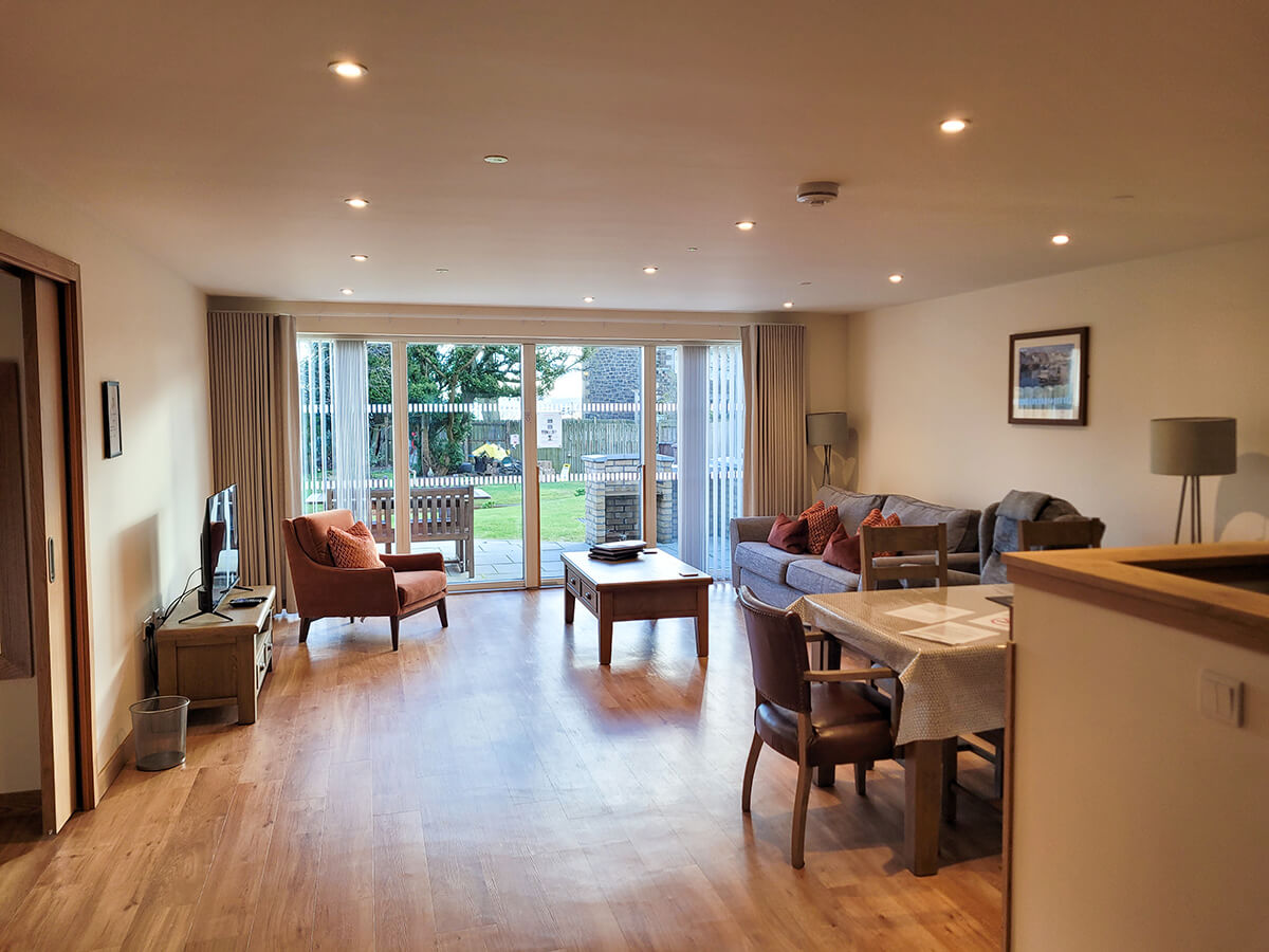 The open plan lounge, dining and kitchen area in the Durham lodge at Homelands in Fife