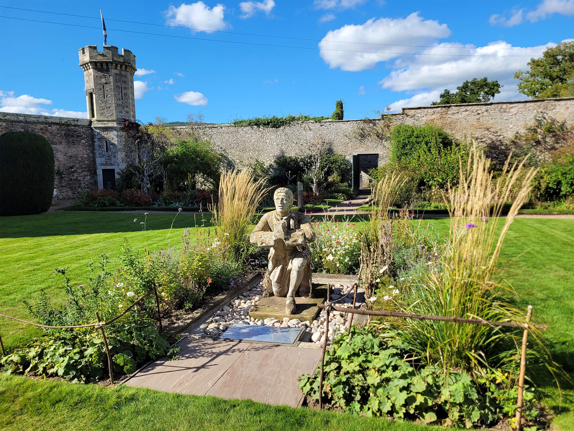 Sir Walter Scott statue in the walled garden of Abbotsford House