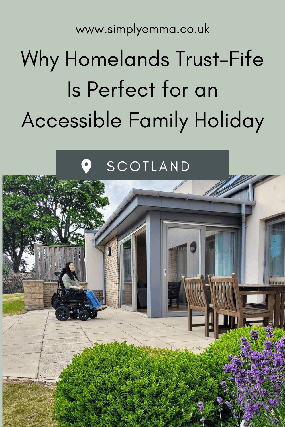 Pinterest image showing Emma in her wheelchair sat outside in front of the Largo lodge at Homelands Trust-Fife, a wheelchair accessible lodge in Scotland. Emma is wearing a green shirt and jeans. Purple lavendar plants and green shrubs are in the fore front of the shot. Text across the image reads, "Why Homelands Trust-Fife Is Perfect for an Accessible Family Holiday".