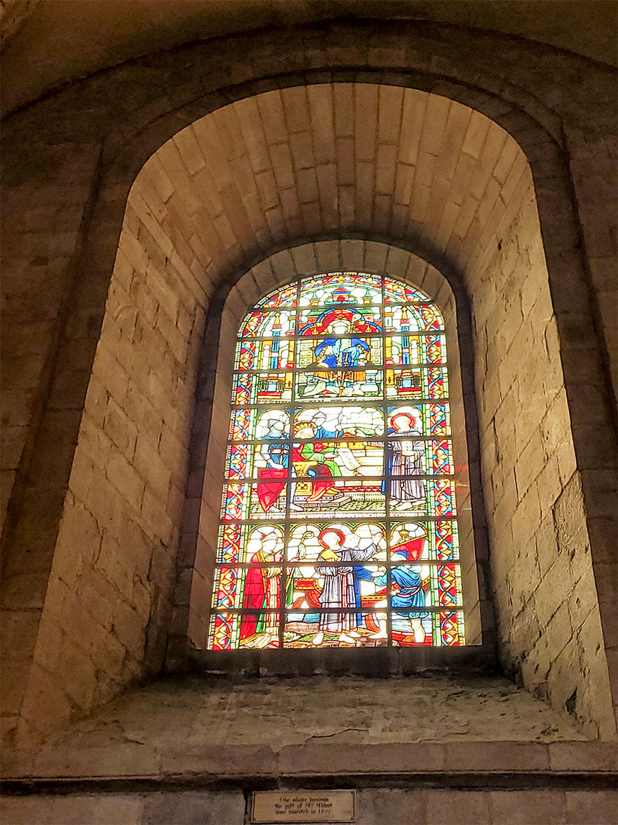 A close up of Durham Cathedral stain glass window