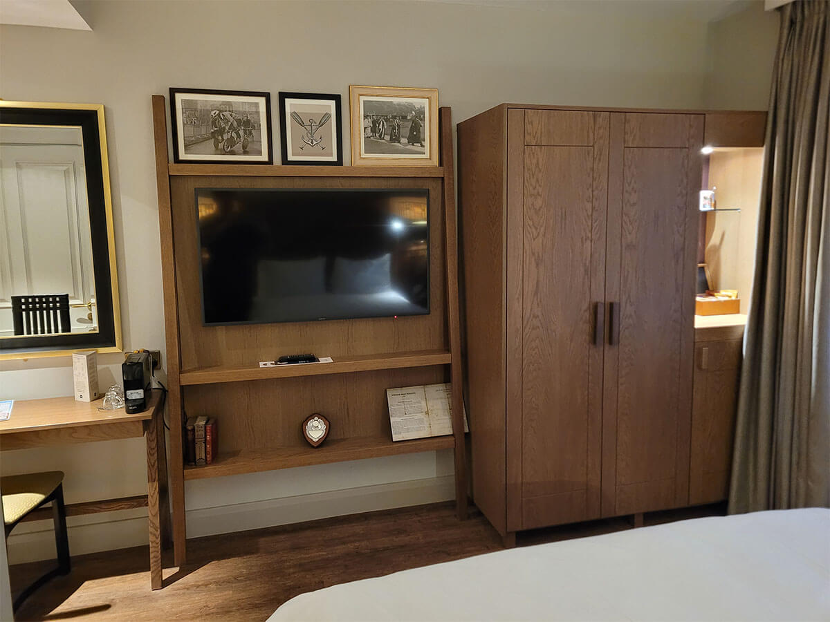 TV wall and wardrobe in the accessible room at Hotel Indigo Durham
